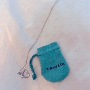 Tiffany Elsa Peretti open heart pendant and necklace.